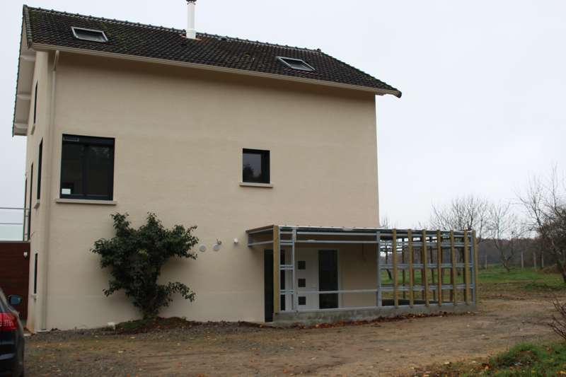 Création d'un garage avec toiture terrasse