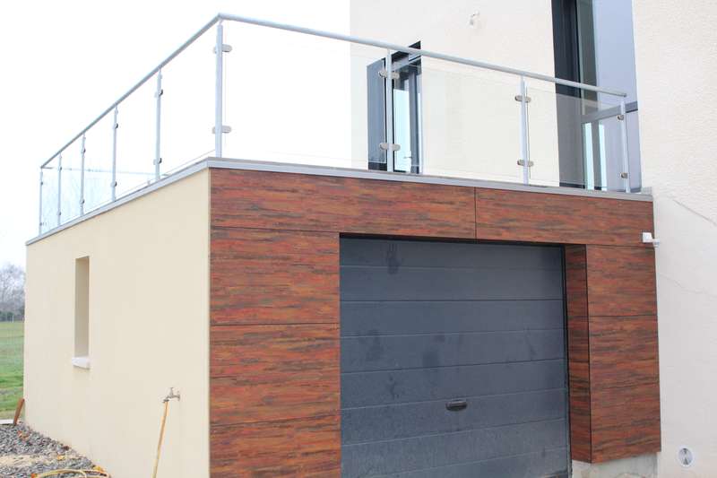 Création d'un garage avec toiture terrasse